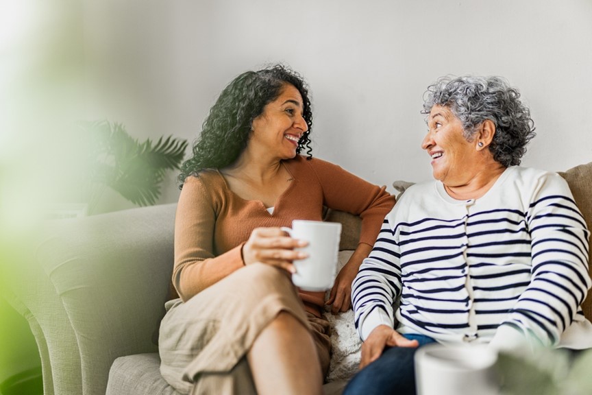 Two people sitting on a couch